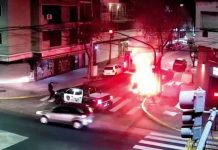 Un hombre incendió un contenedor de basura en Parque Chacabuco, una cámara lo filmó y quedó detenido
